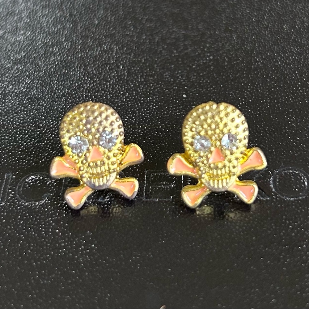 Skull gold pierced earrings